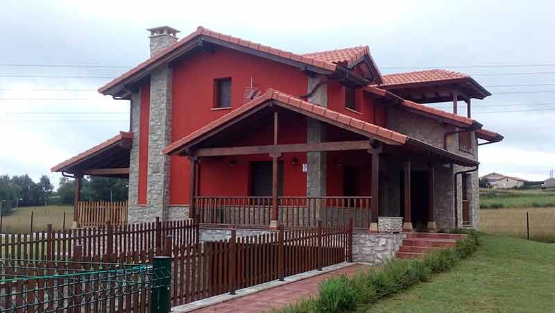 Vivienda unifamiliar con porche y jardín